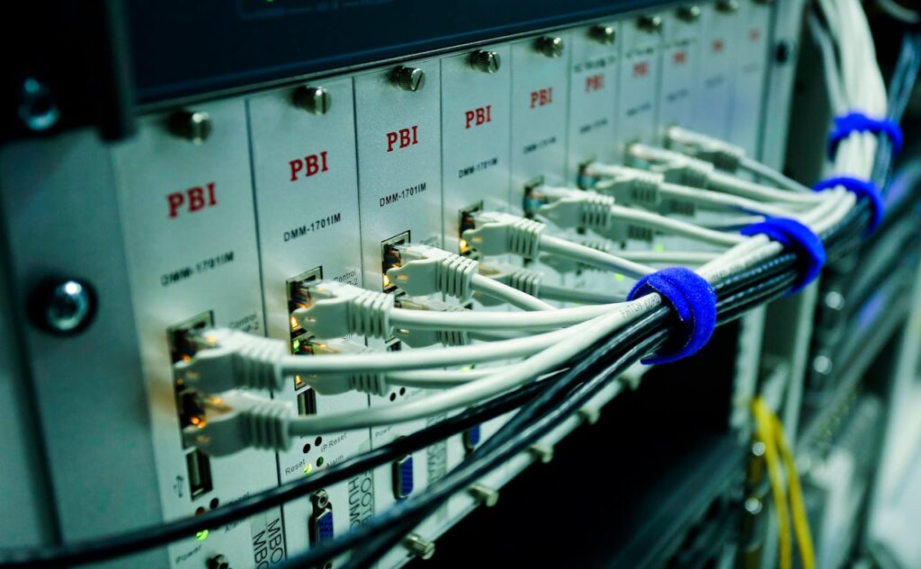 Close Up Photo of Ethernet Cables on Network Switch 